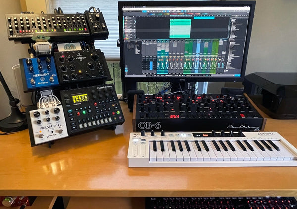 KVgear Utility M3 desktop synth stand with shelves for Elektrons and Meris pedals.