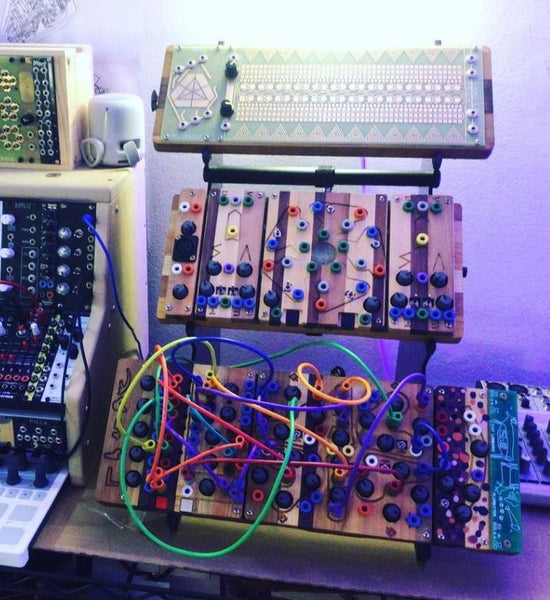 KVgear Utility M3 stand holds Ciat-Lonbard controllers and synths.