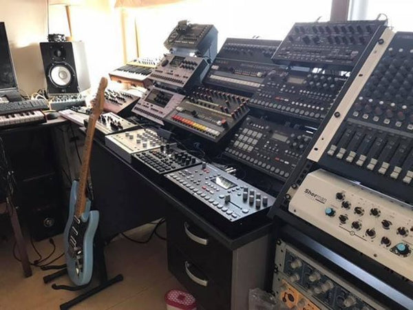 KVgear stand supporting pro gear:  Utility M3 for Machinedrums, Adapt L2 for 808, and Utility M3 for Elektrons