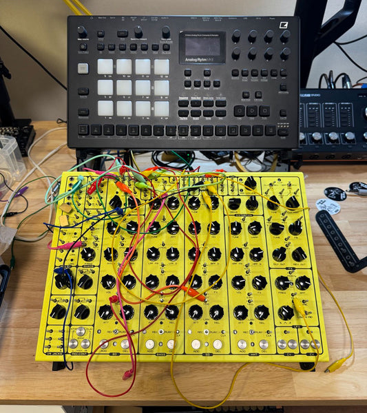 Pulsar-23 and Elektron Analog Rytm Mk II on SynthRISE Adapt L2 desktop synth stand.