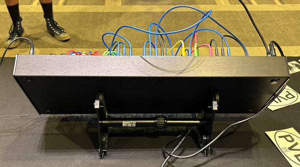 Rear view of SynthRISE modular synth stand with Intellijel case.